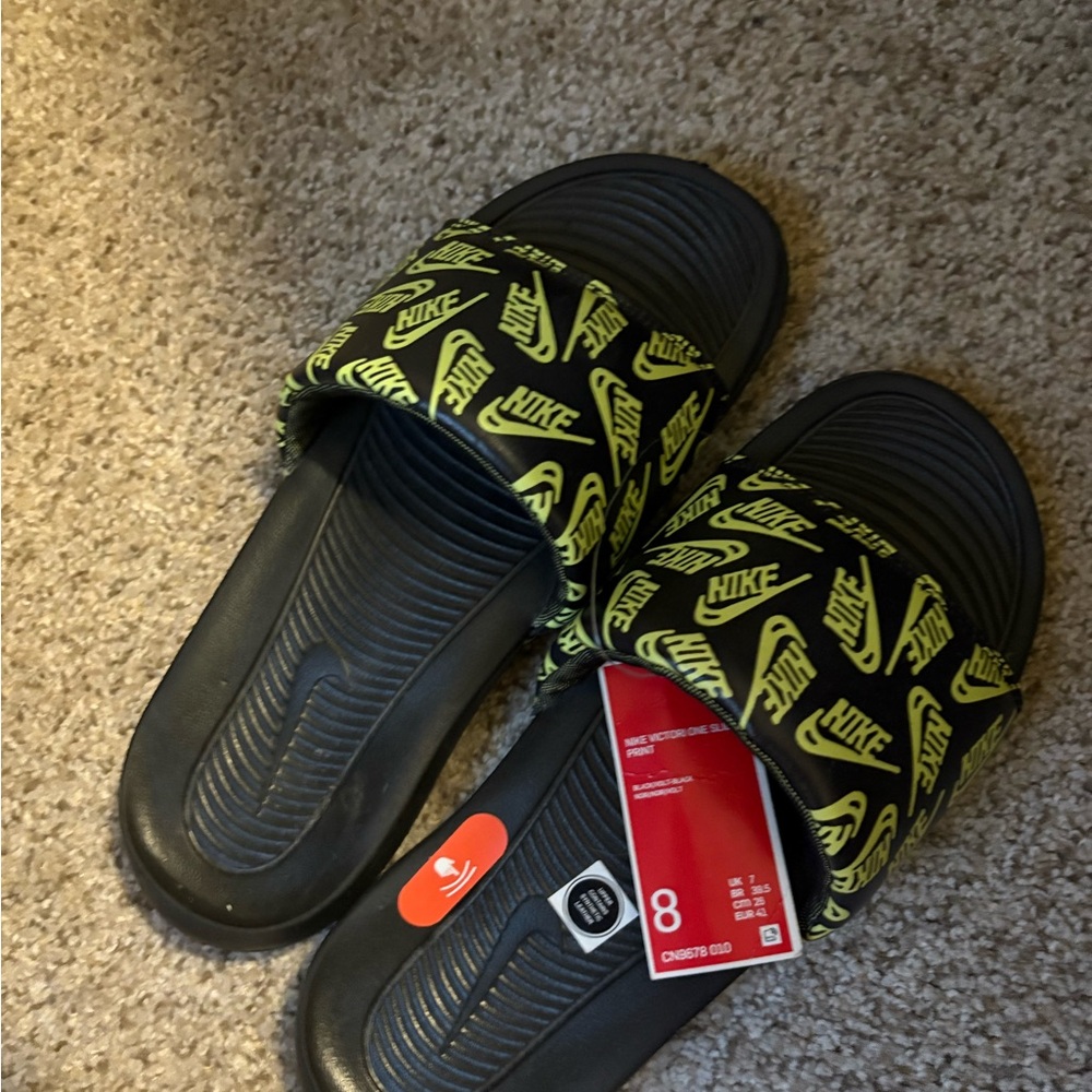 Nike Black and Neon Yellow Logo Slides